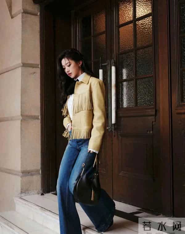朱珠身穿黄色流苏款皮衣外套搭牛仔裤,简直就是天生的“衣架子”